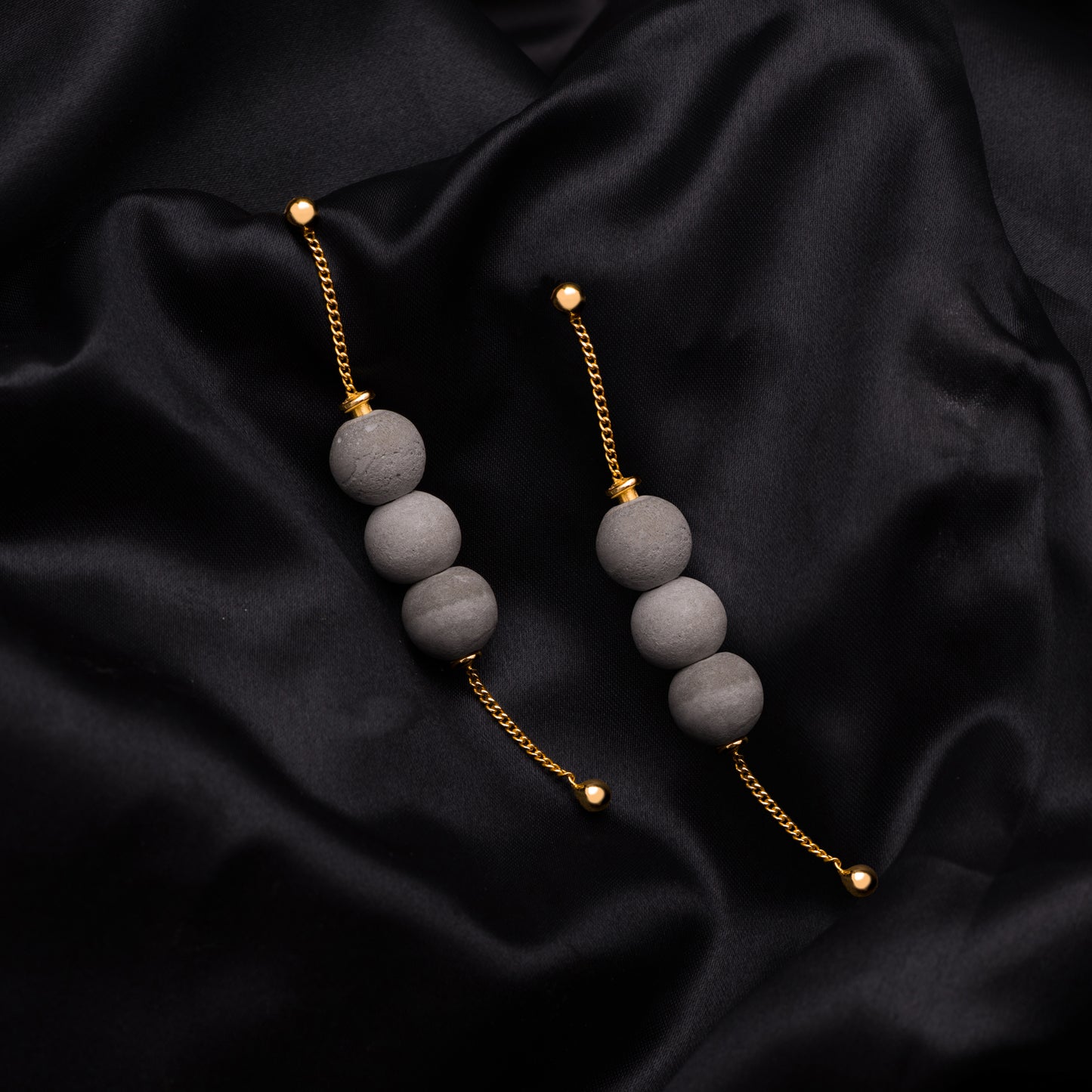 Dangling Orb Earrings – Sculptural Elegance in Motion